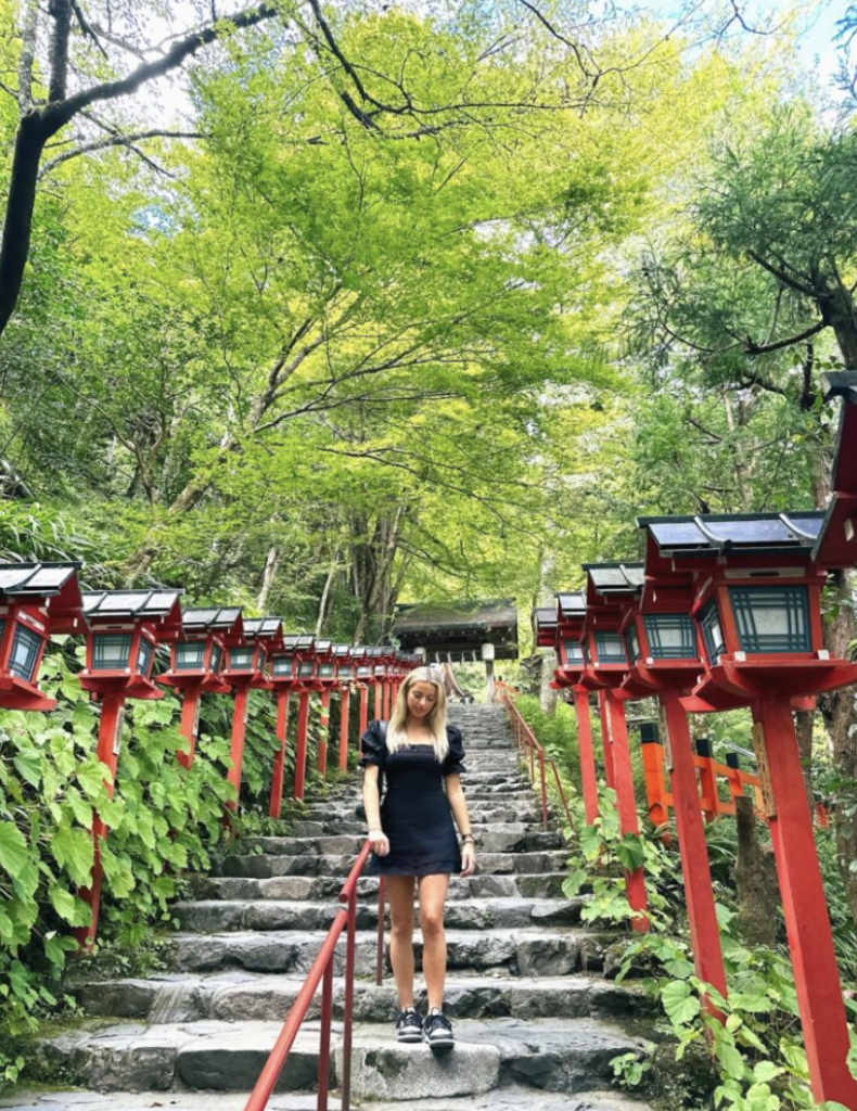 Exploring the Kifune Shinto Shrine surrounded by greenery 