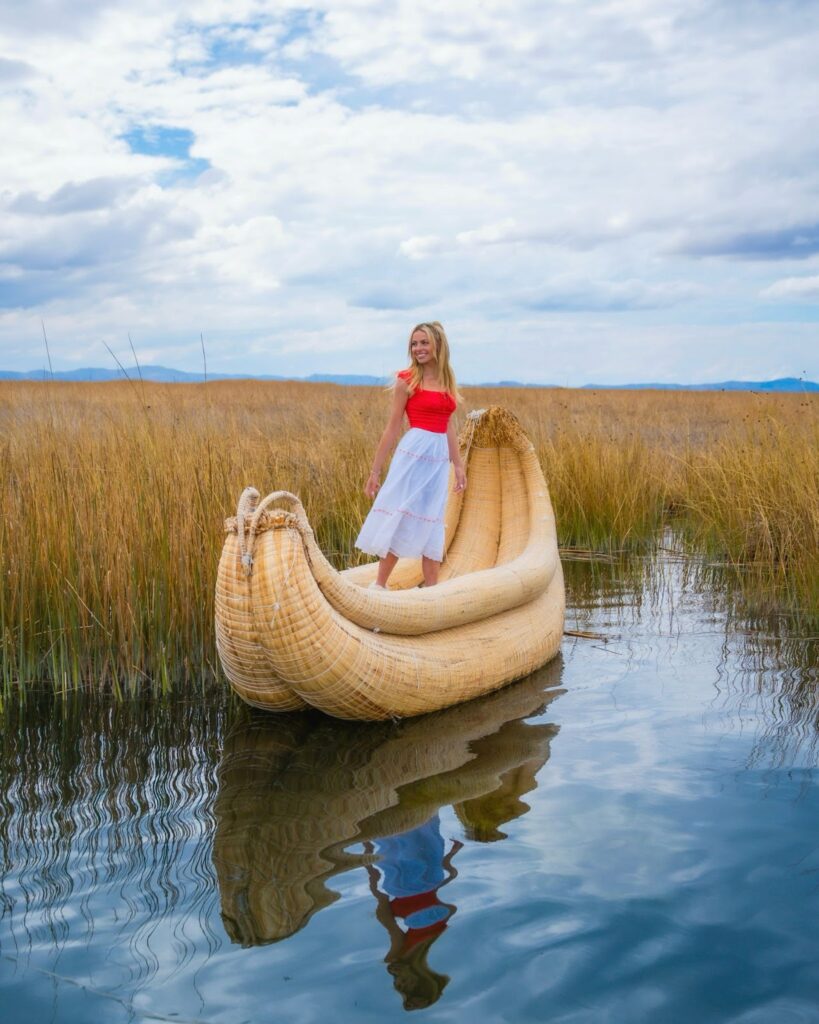 sky standing on a boat on Lake Titicaca