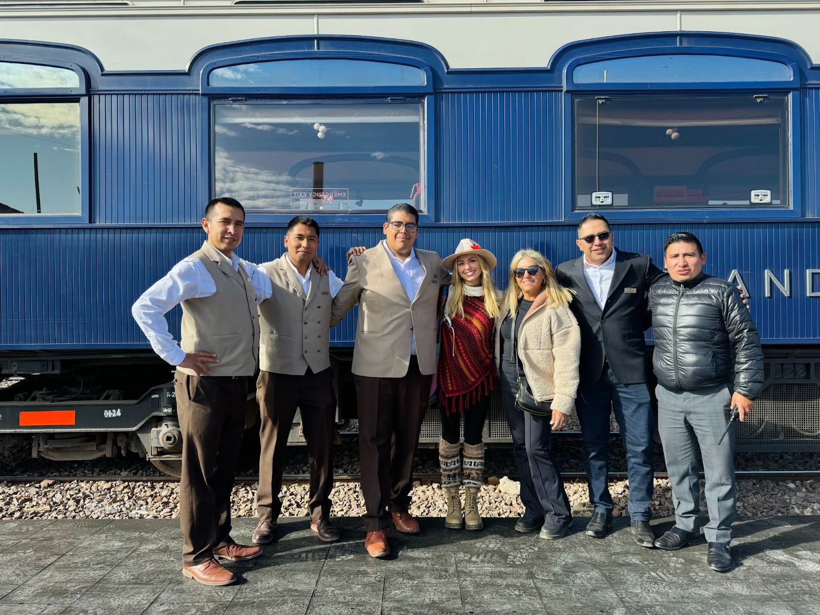 Sky and her mother with the staff of the Belmond Andean Explorer