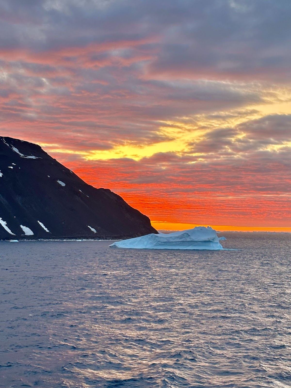 sunset iceberg views in antarctica