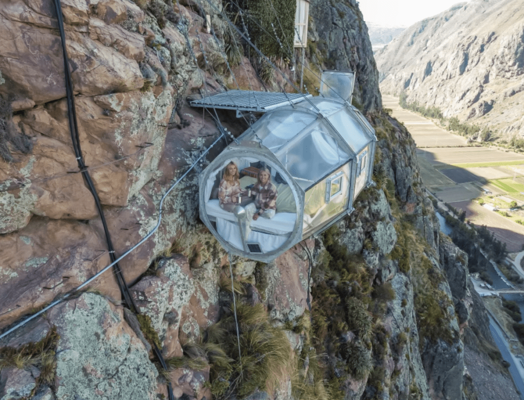 sleep at a cliffside hotel at the Skylodge Adventure Suites in Ollantaytambo Peru