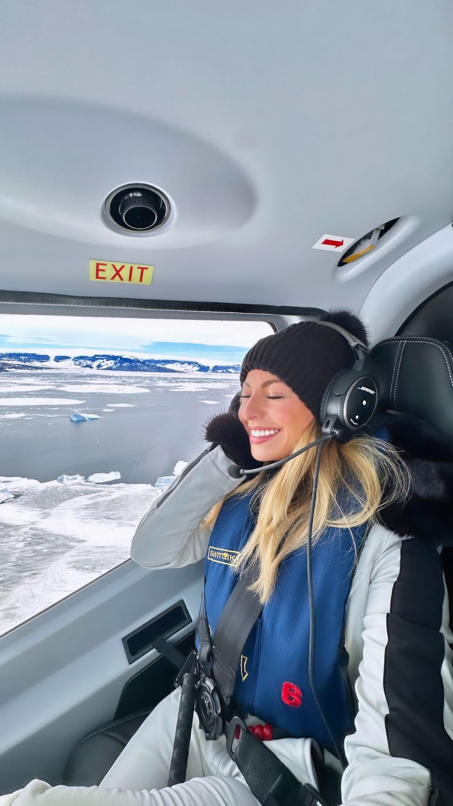 flying over Antarctica in a helicopter