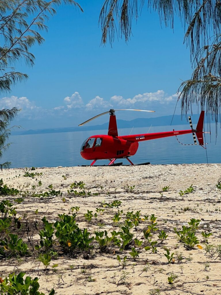 flying above the great barrier reef in australia in a helicopter