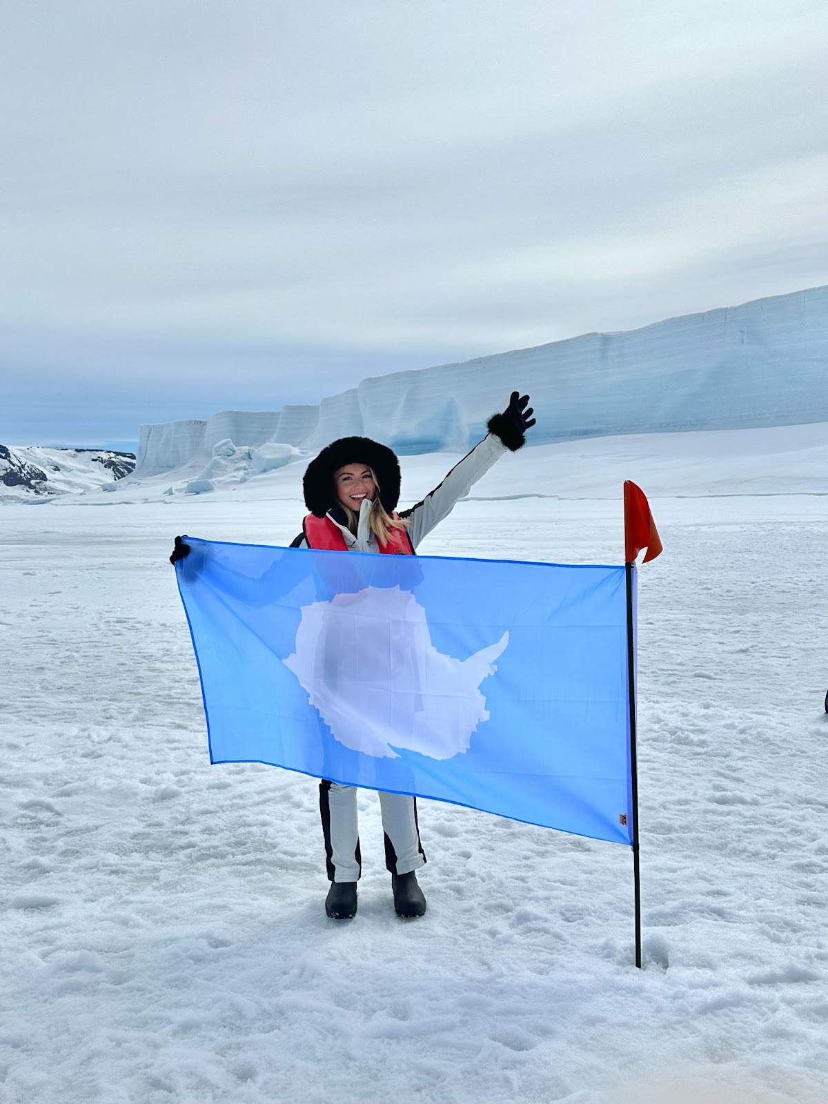 Sky bundled up behind a flag in antarctica