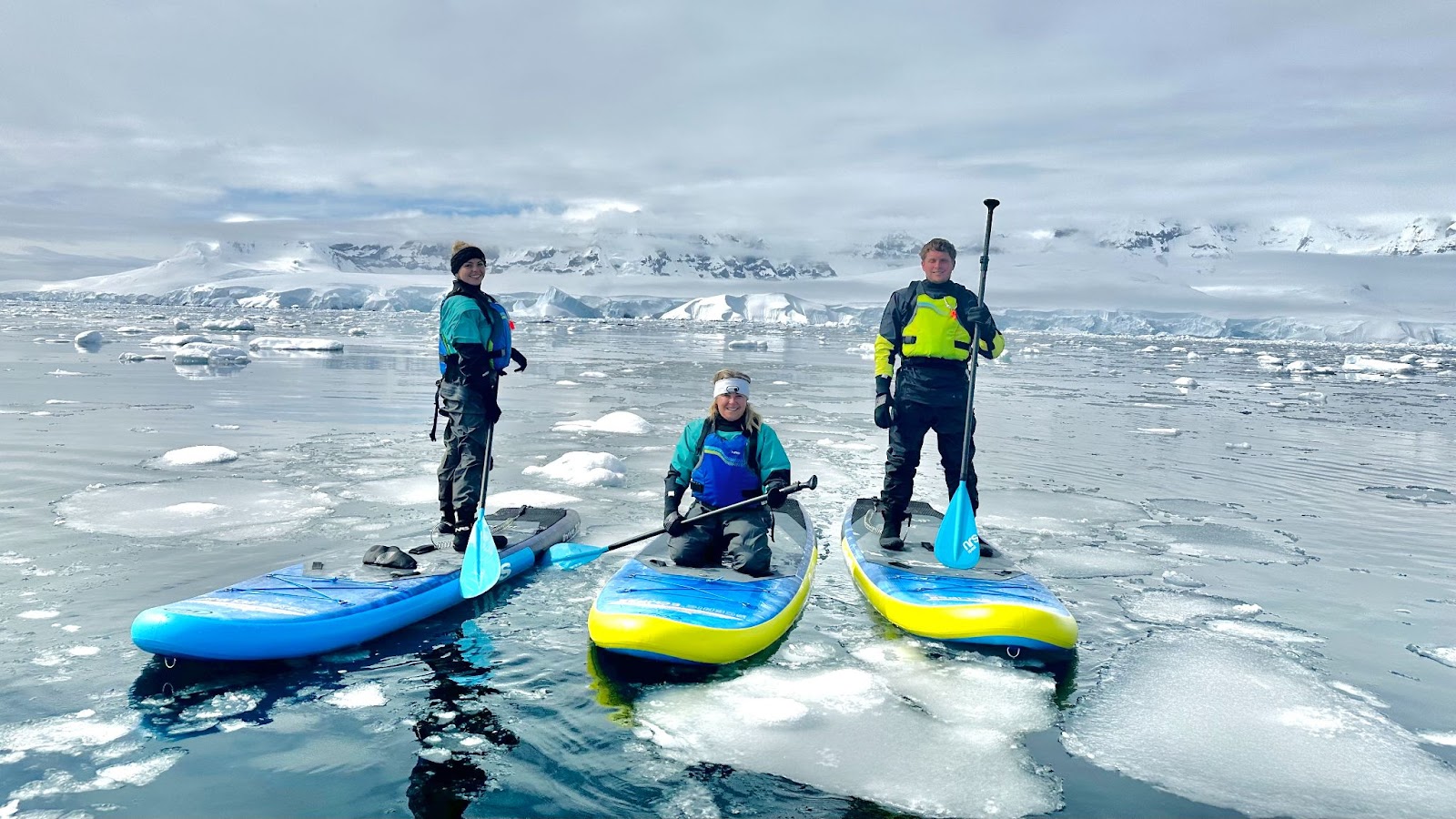 paddleboarding through ice in antarctica